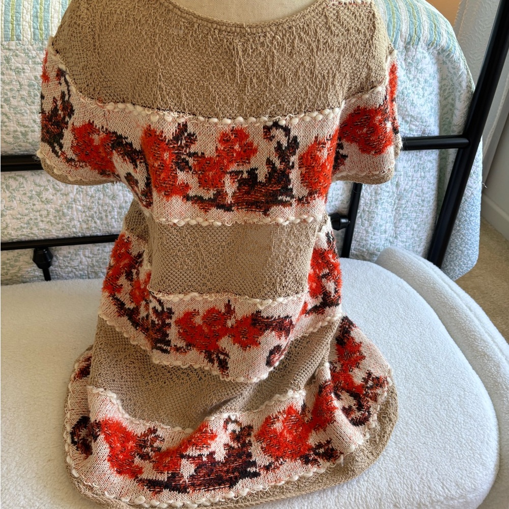 Anthropologie Knitted & Knotted peplum Sweater.